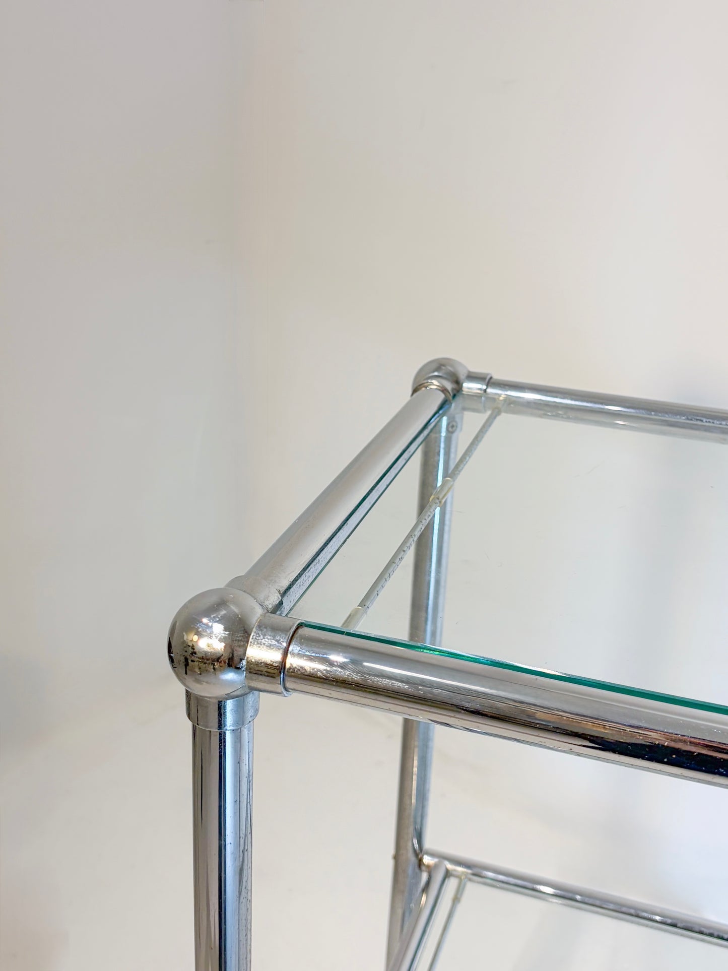 CHROME + GLASS TUBULAR SIDE TABLE (c. 1980s)