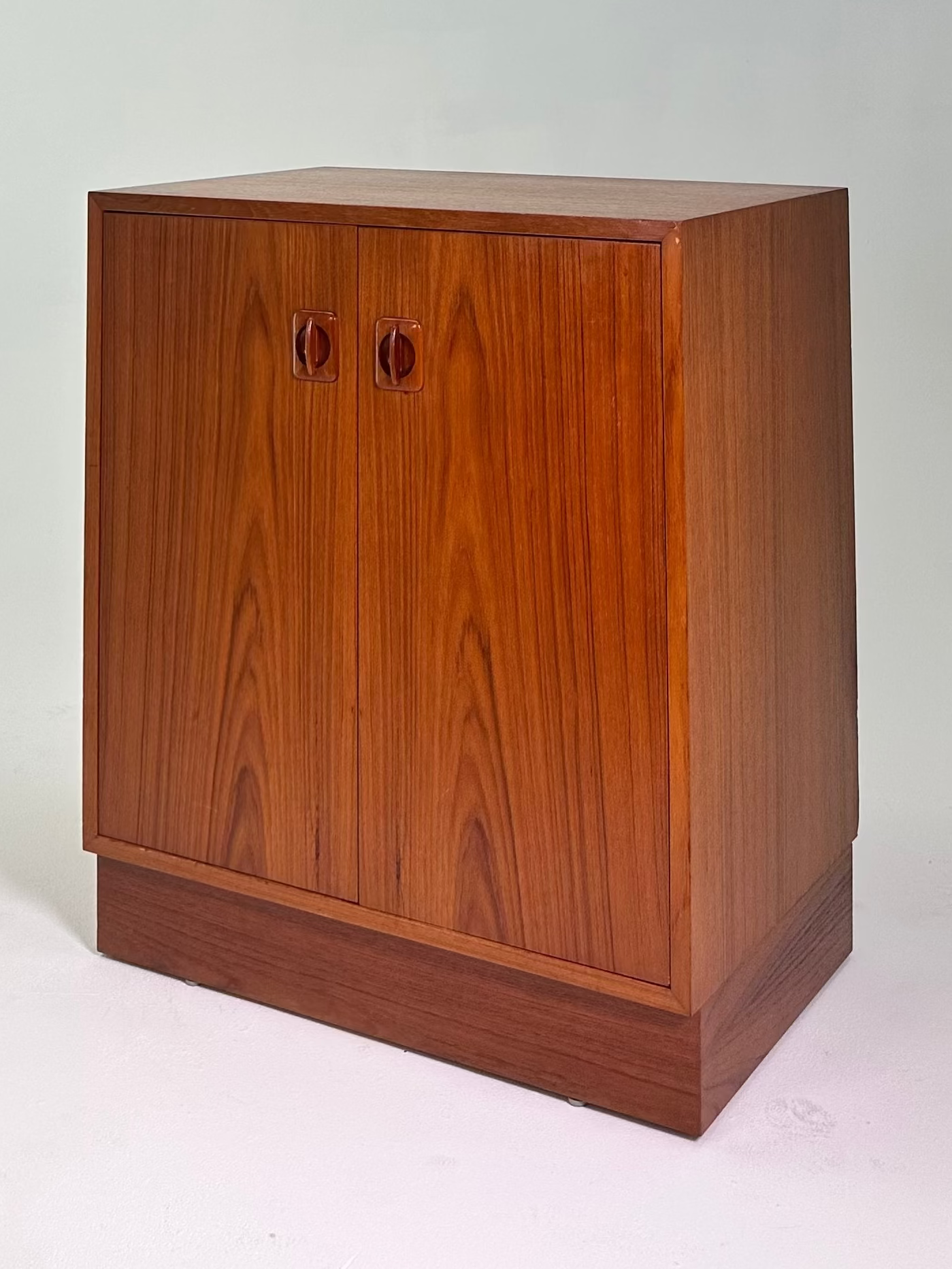 DANISH TEAK CABINET IN THE STYLE OF PETER HVIDT